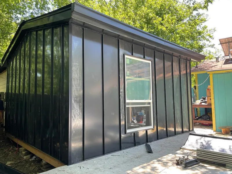 Black standing seam metal wall panels for Metal Roof Installation in Waukee