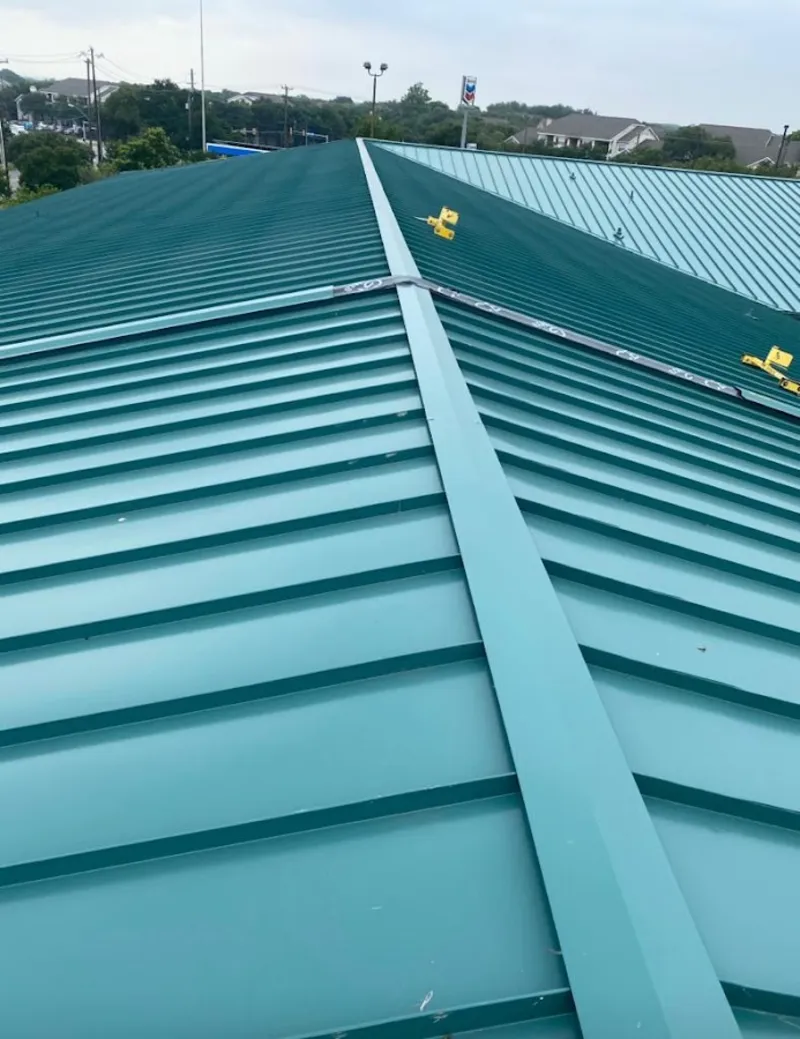 Green commercial metal roof ridge and valley for Metal Roof Repair in Waukee