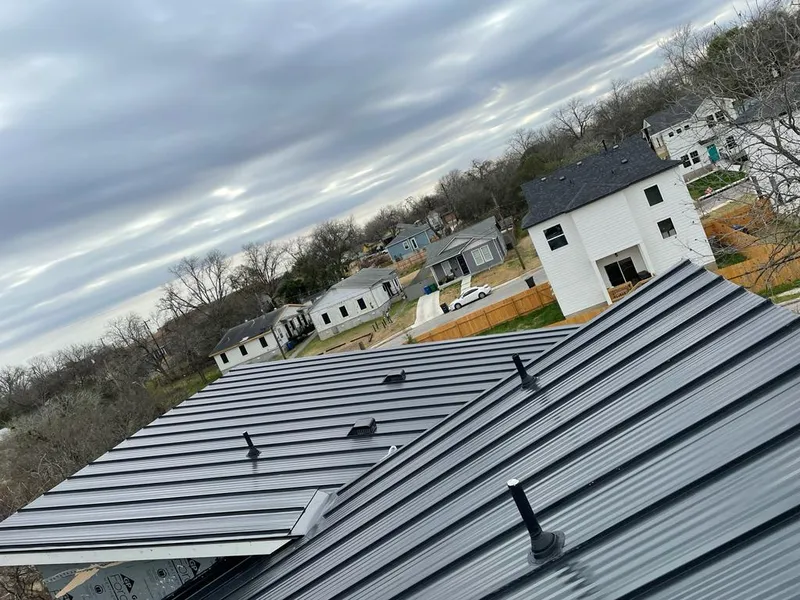Standing seam metal roof panels with vents for Skylight Repair in Waukee